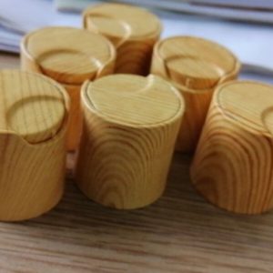 Plastic top caps for lotion and cream